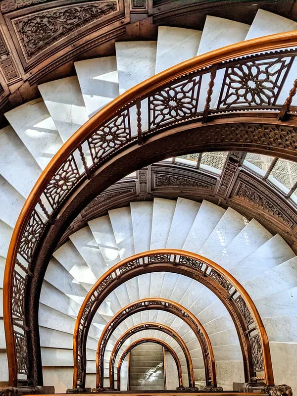 The spiraling staircase inside the Rookery Building light court, a Chicago School masterpiece