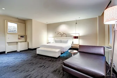 Guest room at The Midland Hotel, a Tribute Portfolio Hotel