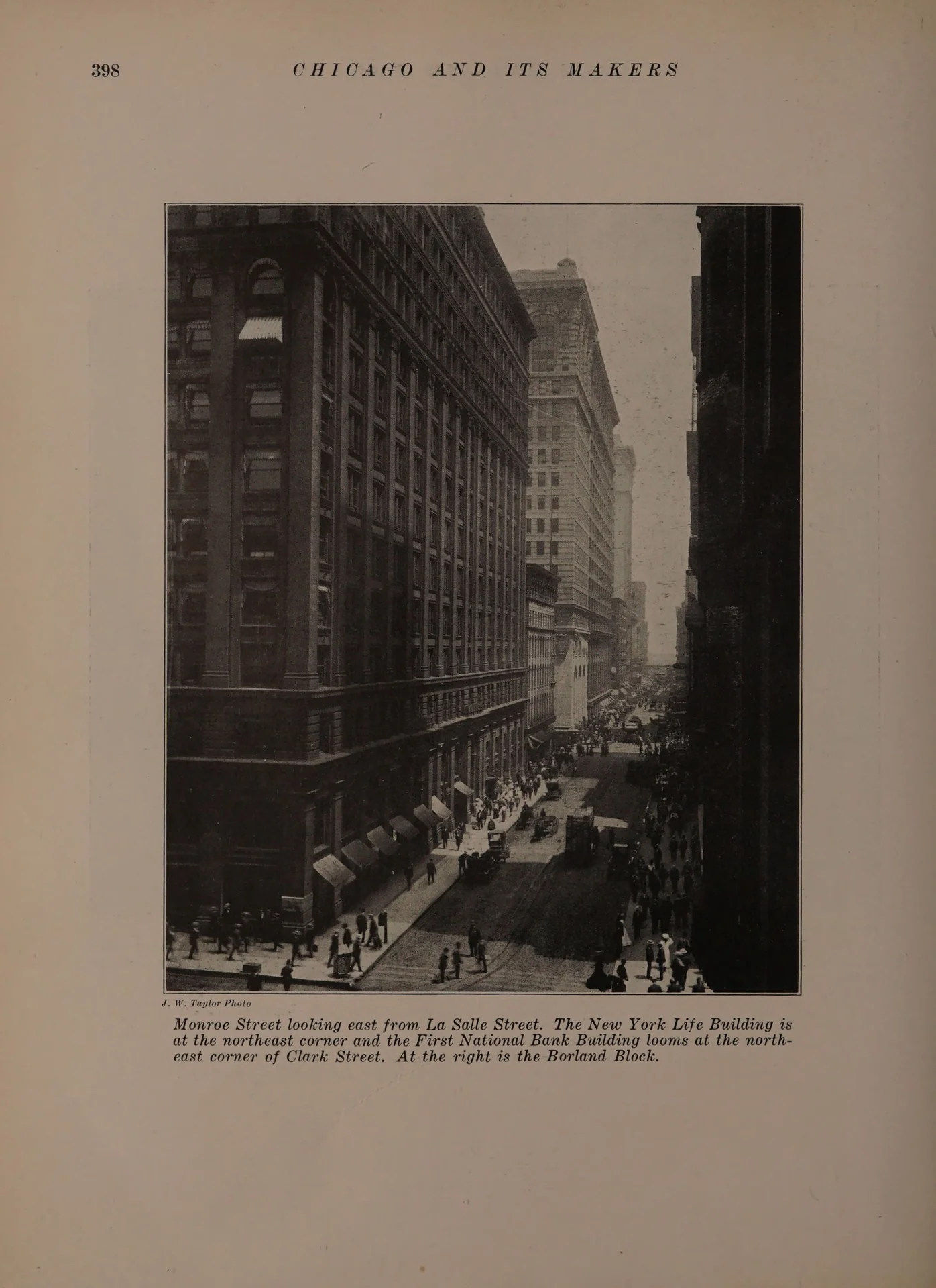 A J. W. Taylor photograph of Monroe Street looking east from La Salle, the New York Life Building at the northeast corner